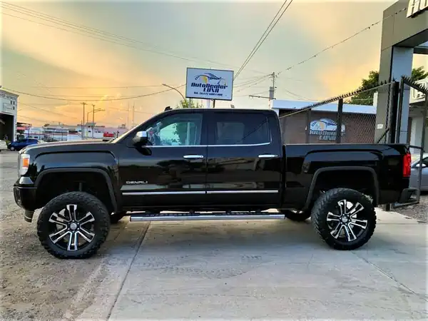 Descargar Manual de Propietario GMC Sierra Denali 2014 en Español PDF Gratis