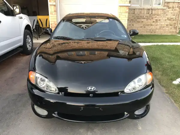 Descargar Manual de Propietario HYUNDAI Tiburon 1997