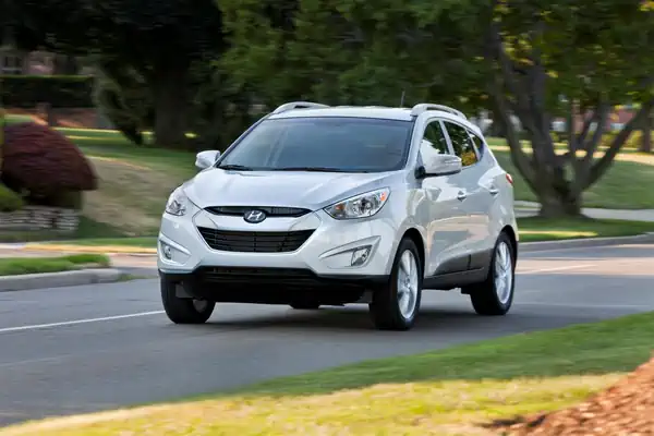 Descargar Manual de Propietario HYUNDAI Tucson 2013