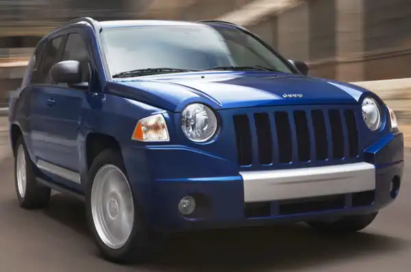 Descargar Manual de Propietario Jeep Compass OM 2010