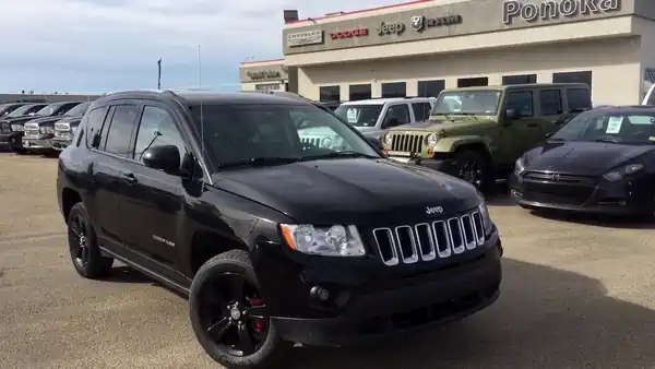 Descargar Manual de Propietario Jeep Compass OM 2013