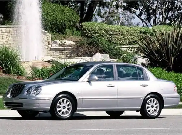 Descargar Manual de Propietario KIA Amanti 2004