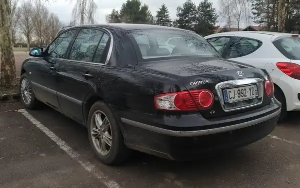 Descargar Manual de Propietario KIA Opirus 2006