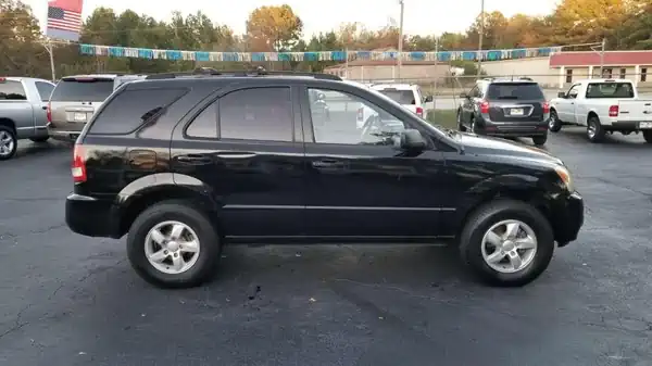 Descargar Manual de Propietario KIA Sorento 2006