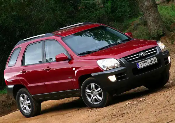 Descargar Manual de Propietario KIA Sportage 2006