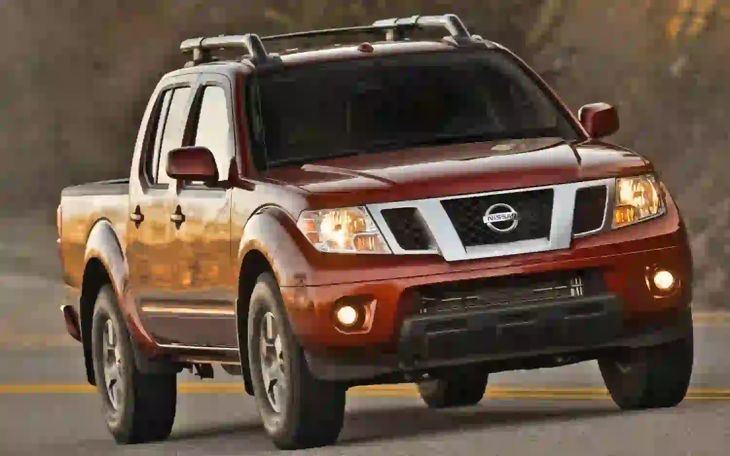 Descargar Manual de Propietario Nissan Frontier 2013