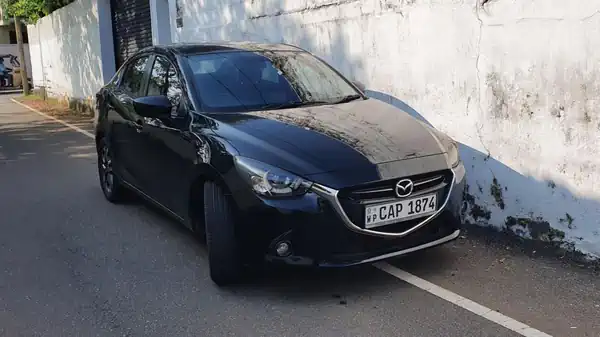Descargar Manual de Propietario Mazda 2 2016 en Español PDF Gratis