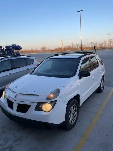 Descargar Manual de Propietario PONTIAC Aztek 2004