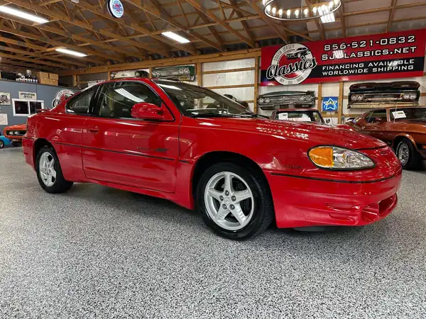 Descargar Manual de Propietario PONTIAC Grand Am 1999