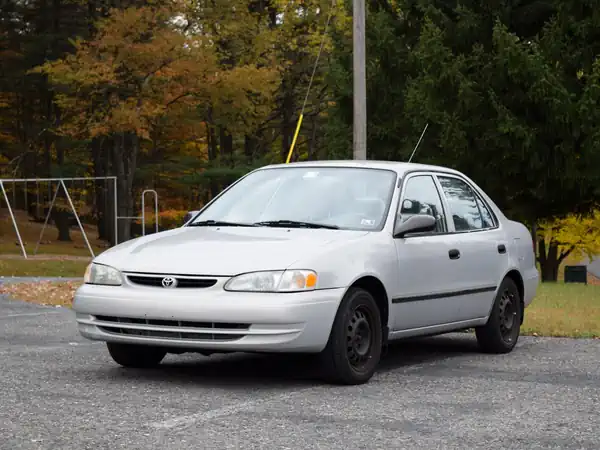 Descargar Manual de Propietario TOYOTA Corolla 1999